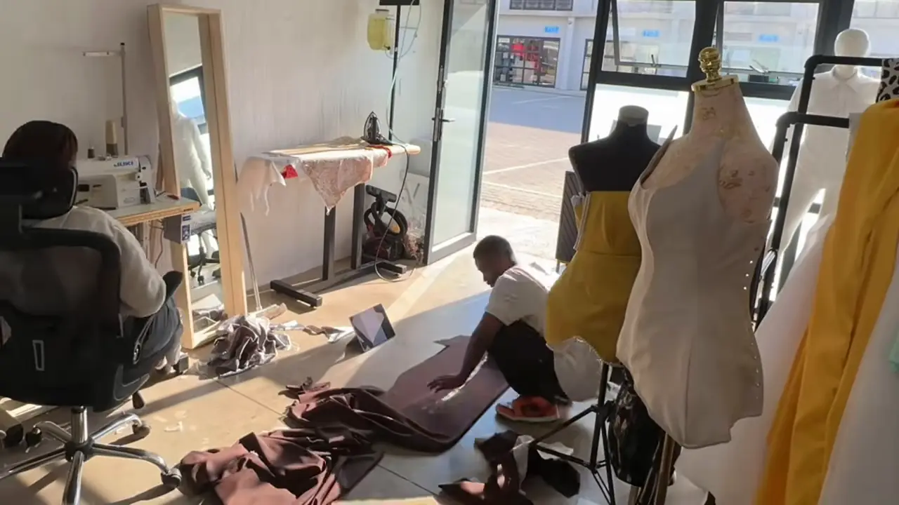 The EZY atelier with dress forms by the window